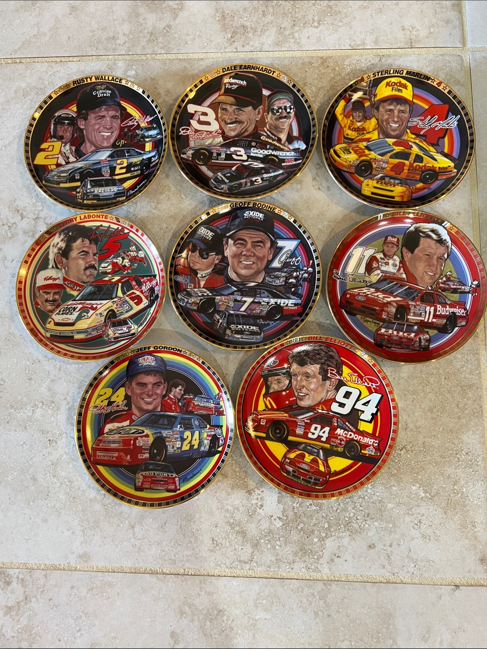 Set of eight racing driver plates